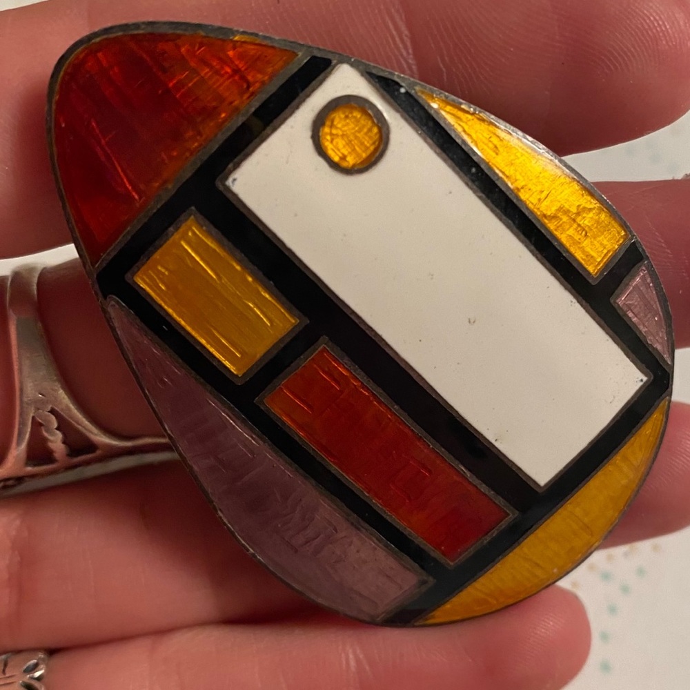 Warm colored brooch